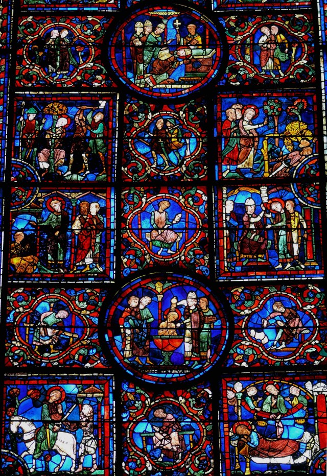 Vitrail de Chartres, St Martin ; le réseau des contours des figures se prolonge clairement dans le réseau géométrique des structures, jusqu' à l'architecture même.